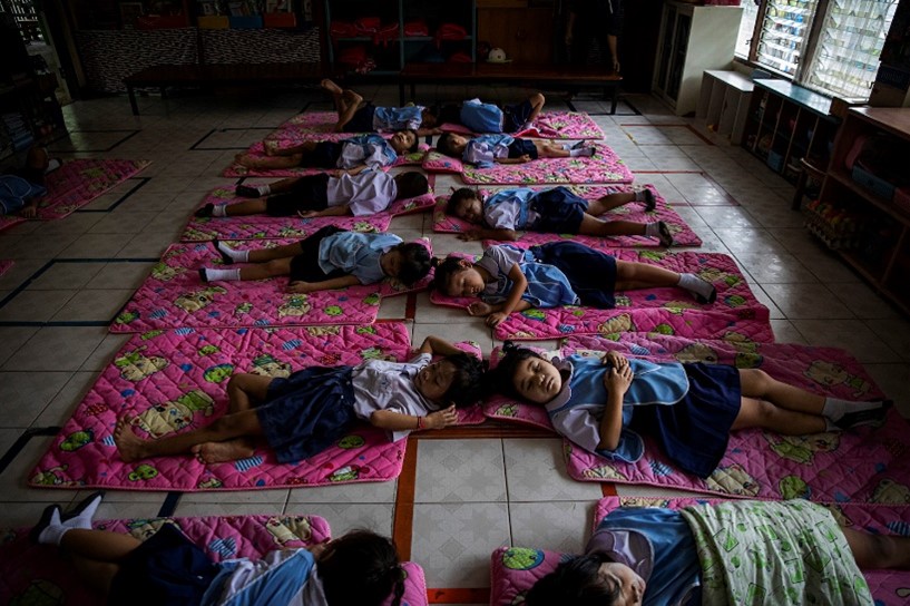 Students take their afternoon nap at the Mercy Centre kindergarten in Klong Toey. (Lauren DeCicca/The New York Times)